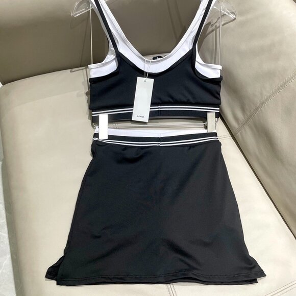 ALO Yoga Black & White Ribbed Sports Bra and Skirt Set - Picture 6 of 6